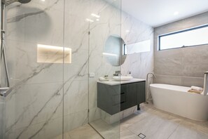 Shower, hair dryer, towels