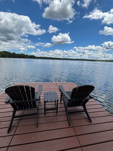 Beautiful 3 bed/2bath updated cabin w sandy swimmable frontage & great fishing.