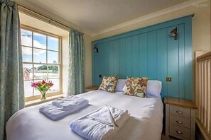 Luxe beddengoed, individueel gemeubileerd, een strijkplank/strijkijzer