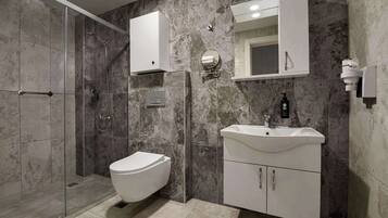 Hair dryer, bidet, towels, soap