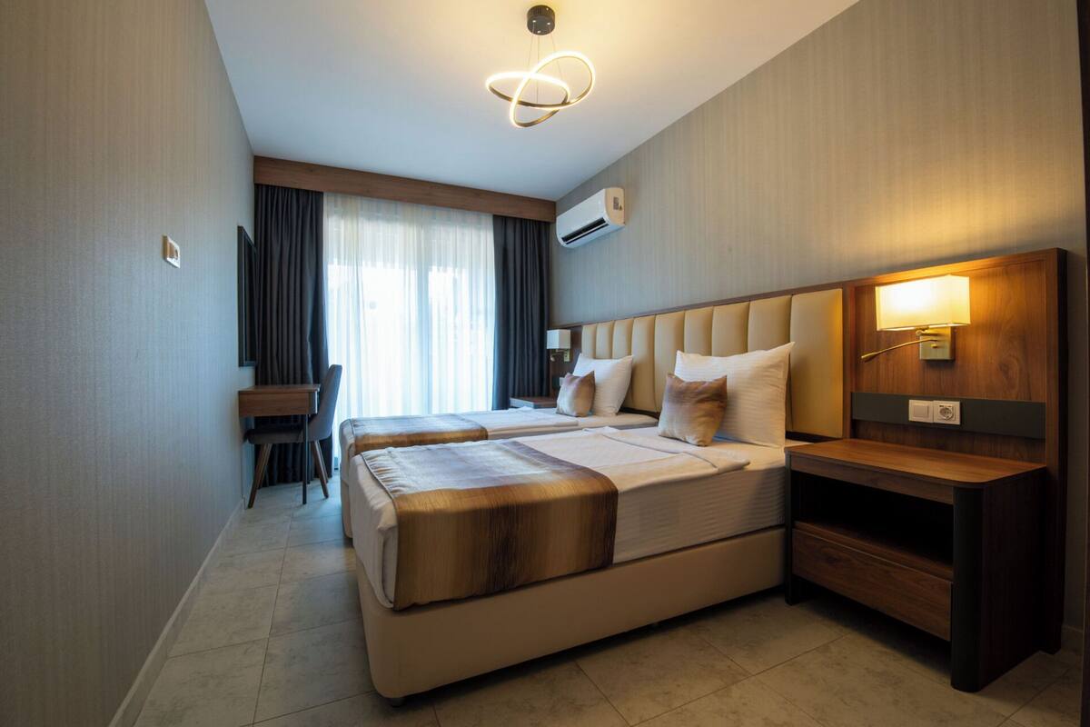 Minibar, chambres insonorisées, fer et planche à repasser, Wi-Fi gratuit