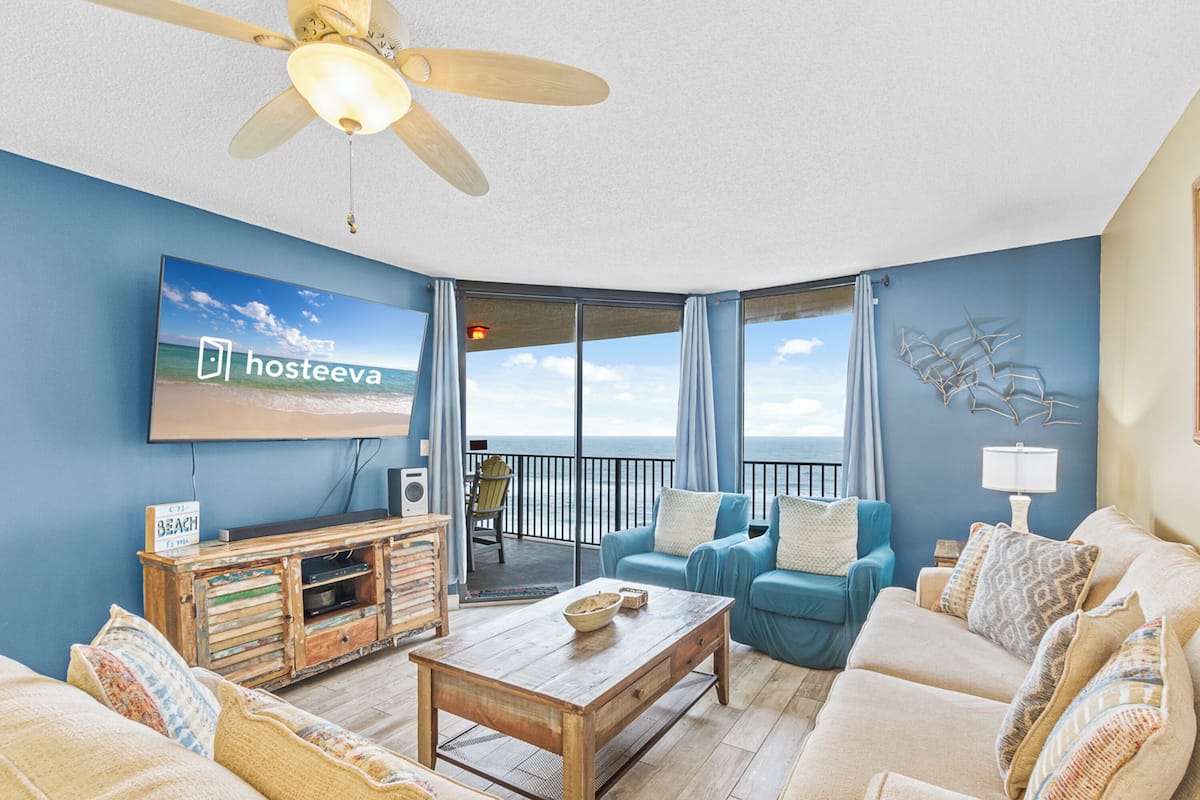 Signature Condo | Living room | 65-inch flat-screen TV with cable channels