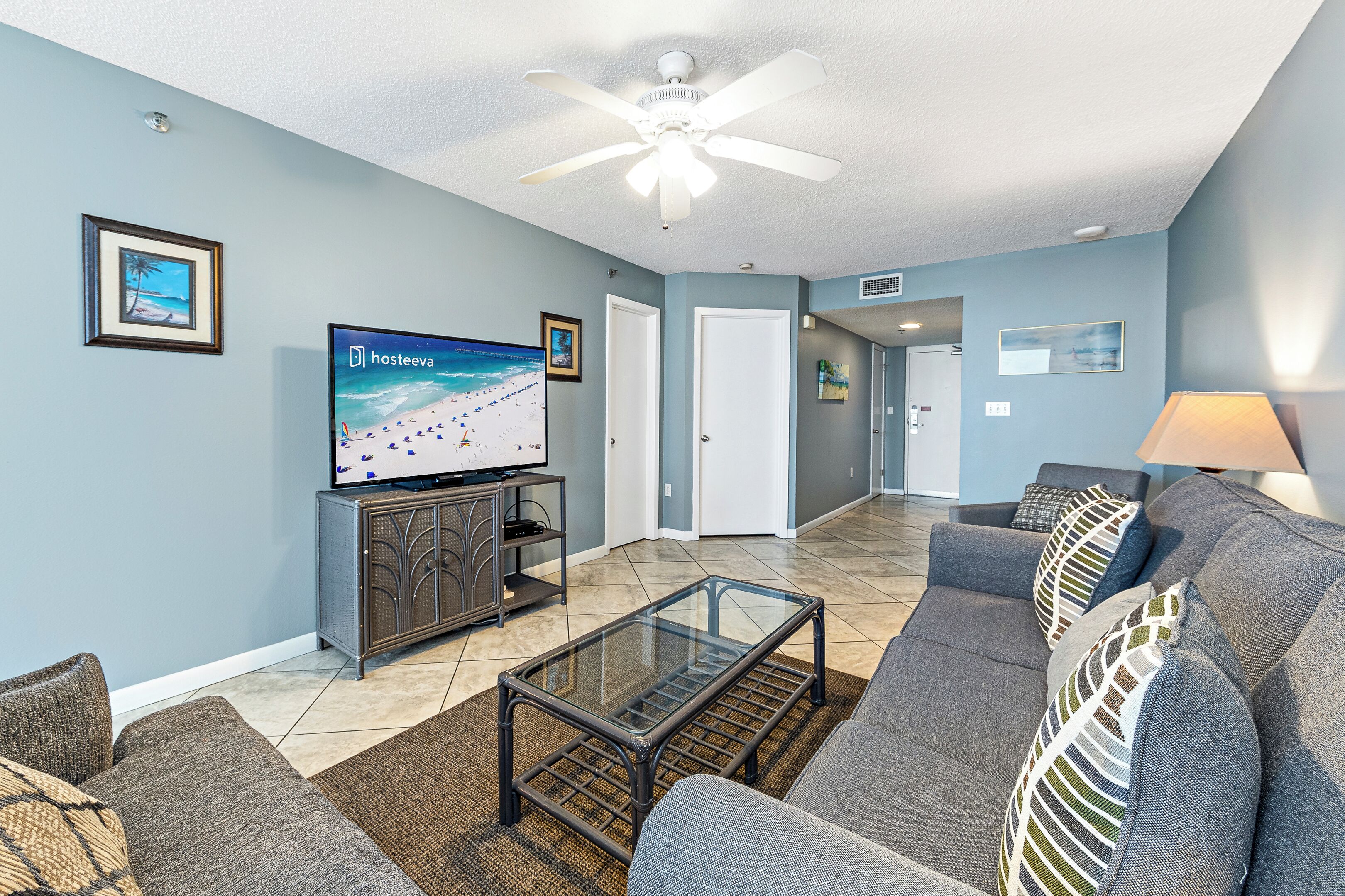 Panoramic Condo, 1 Bedroom, Balcony, Ocean View | Living room | 65-inch flat-screen TV with cable channels