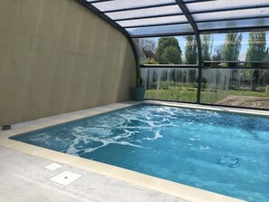 Alberca techada y alberca climatizada