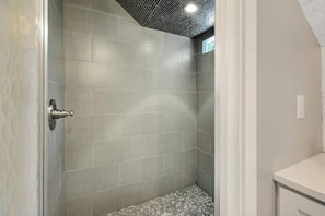 Shower, hair dryer, shampoo