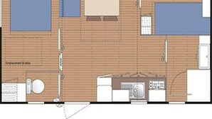 Grundriss eines Hotelzimmers mit Bad, Küchenzeile und einer Sitzecke.