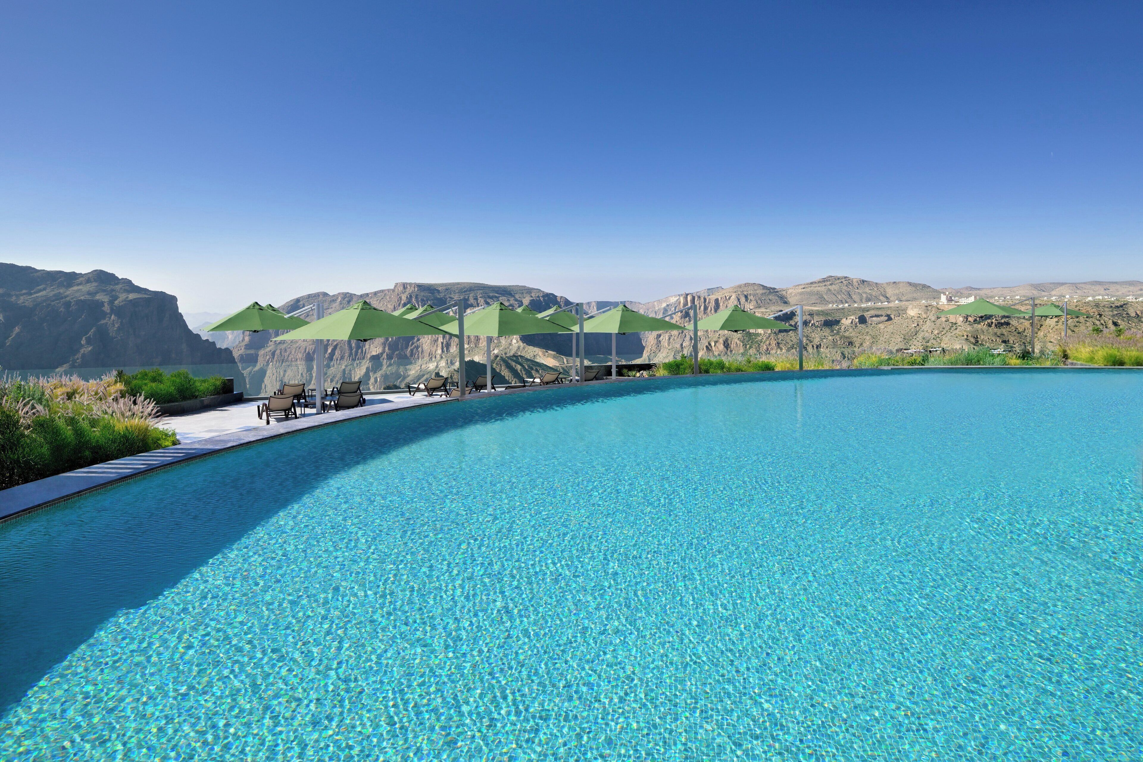 Indoor pool, outdoor pool, open 6:00 AM to 6:00 PM, pool umbrellas