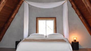 Sleep like a royal family member on the king-size bed in the loft bedroom.