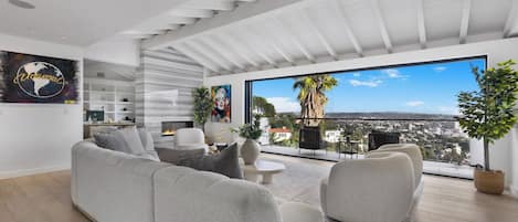 Luxury House, Multiple Beds, Pool Access, City View (Maravilla) | Living area | 50-inch flat-screen TV with digital channels, TV, fireplace