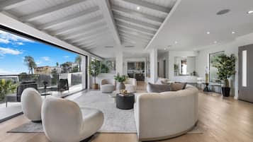 Luxury House, Multiple Beds, Pool Access, City View (Maravilla) | Living area | 50-inch flat-screen TV with digital channels, TV, fireplace