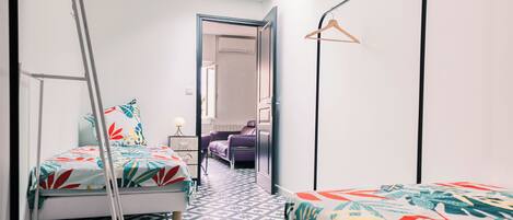 2 habitaciones, tabla de planchar con plancha, wifi y ropa de cama