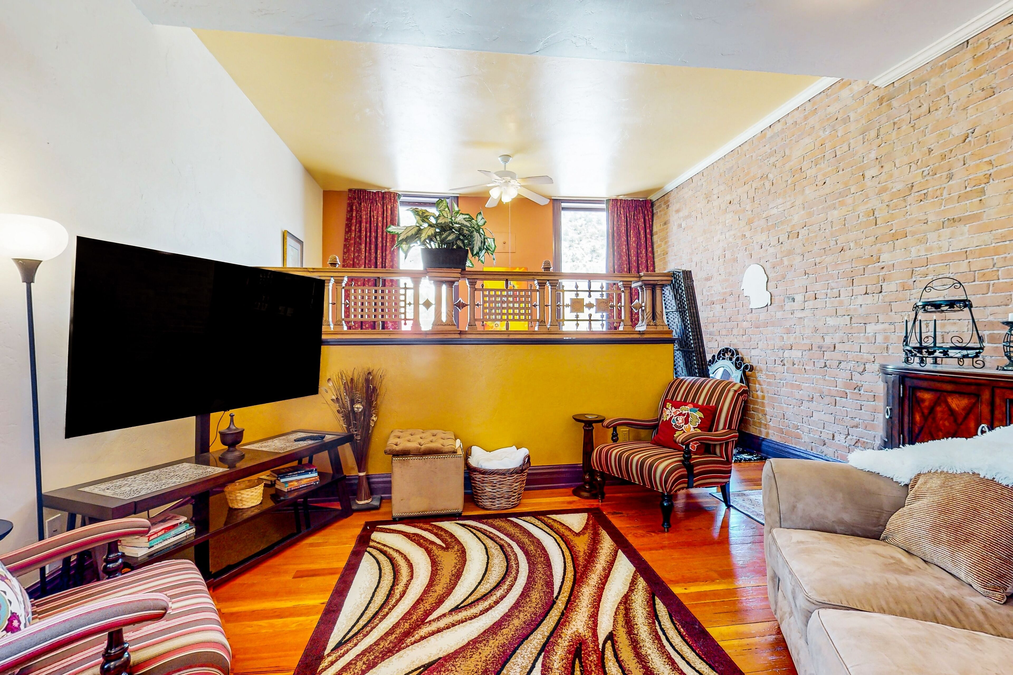 Beautifully restored Main Street loft with deck, river views & prime location