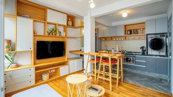 Apartment, 1 Queen Bed, Balcony | Living area | 50-inch flat-screen TV with satellite channels, TV