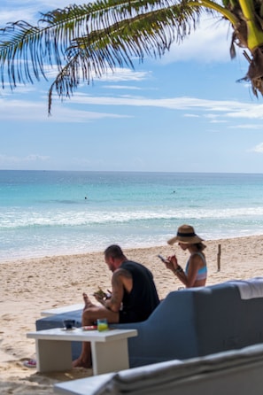 Private beach, white sand, beach umbrellas, beach towels