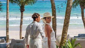 Private beach, white sand, beach umbrellas, beach towels
