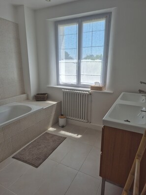 Shower, hair dryer, towels, toilet paper