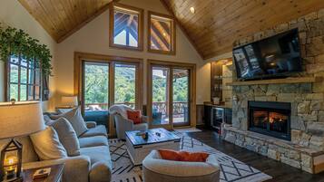 Cabin, Multiple Beds, Patio, Mountain View (Black Bear Den at Eagles Nest) | Living area | Fireplace