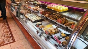 A bakery display case with various baked goods. - Cozy Mediterranean Escape  (Schenectady)