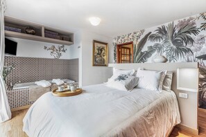 2 slaapkamers, een strijkplank/strijkijzer, gratis wifi, beddengoed