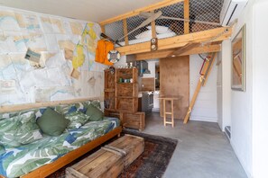 Living area - Studio Apartment 'Repaire Des Pirates Sainte Marie' with Private Terrace, Wi-Fi and Air Conditioning (Sainte-Marie-la-Mer)