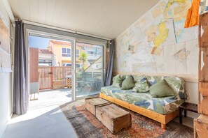 Living area - Studio Apartment 'Repaire Des Pirates Sainte Marie' with Private Terrace, Wi-Fi and Air Conditioning (Sainte-Marie-la-Mer)