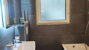 Hair dryer, towels, soap, toilet paper