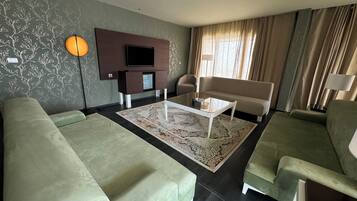 Suite Premium | Literie de qualité supérieure, minibar, coffres-forts dans les chambres