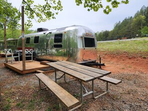 Outdoor dining - Vintage 1971 Airstream on the creek, easy access to pool and playground, sleeps 2. (Mill Spring)