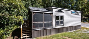 2-story tiny home nestled on the creek, quick walk to pool and playground, private firepit, sleeps 7.