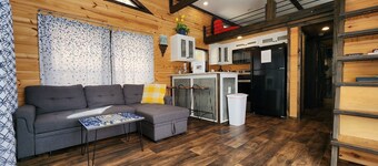 2-story tiny home nestled on the creek, quick walk to pool and playground, private firepit, sleeps 7.