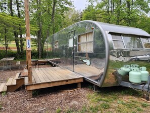 Property grounds - Vintage camper on the creek, short walk to pool and playground, deck, gas grill, sleeps 2. (Mill Spring)