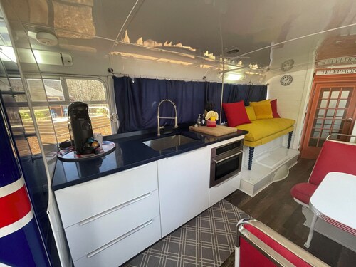 Vintage 1962 double decker bus on the creek, gas grill, fire pit, short walk to pool and playground, sleeps 4-5.