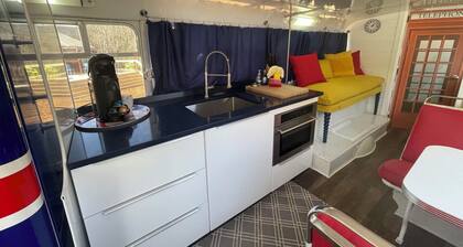 Vintage 1962 double decker bus on the creek, gas grill, fire pit, short walk to pool and playground, sleeps 4-5.