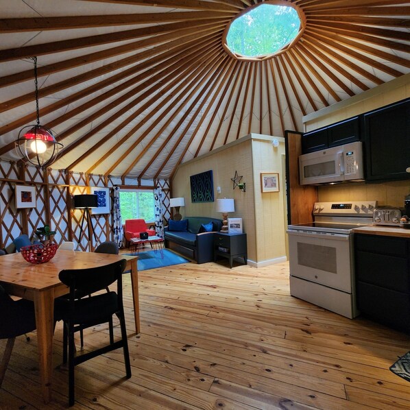Interior - Dog friendly 30' Yurt, large dome skylight, king bed, 2 bedrooms, sleeps 6. (Mill Spring)