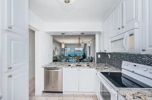 Fridge, microwave, oven, stovetop - Discover the Epitome of Waterfront Living in this Stunning condo on Isla del Sol!~ (St Petersburg)