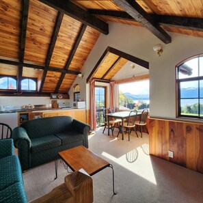 Classic Chalet | Living area - Manapouri Holiday Park (Manapouri)