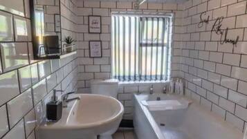 Hair dryer, towels, soap, shampoo