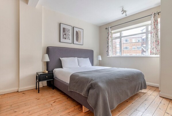 1 غرفة نوم ومكواة/لوح كي وواي فاي وملاءات أسرّة