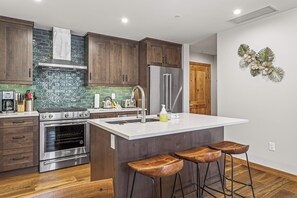 Microwave, oven, stovetop, dishwasher - Spring Creek Vacations 1 BR Condo 205TM (Canmore)