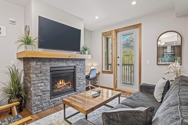 TV, fireplace - Spring Creek Vacations 1 BR Condo 205TM (Canmore)