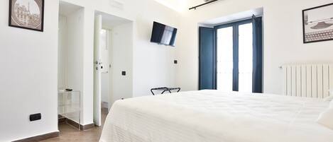 1 dormitorio, tabla de planchar con plancha, wifi y ropa de cama