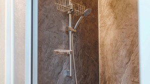 A shower with a handheld showerhead and a wall-mounted control panel. - Jade in the Wilderness (碧野寮) (Dahu Township)