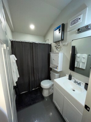 Hair dryer, towels, soap, toilet paper