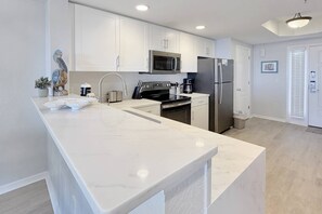 Fridge, microwave, dishwasher, coffee/tea maker