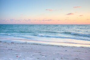 On the beach, beach towels, motor boating