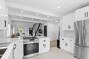 Oven, stovetop, dishwasher, coffee/tea maker - Spacious 4BR Retreat w/ Private Hot Tub – Perfect for Groups! (Denver)