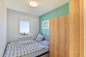 1 habitación, tabla de planchar con plancha, wifi gratis y ropa de cama 