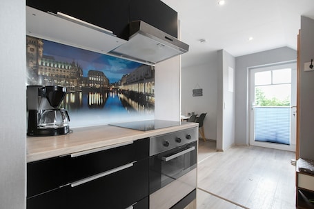 Fridge, oven, stovetop, dishwasher. Holiday Apartment Huus 39 – Quiet Cul-de-Sac, Balcony, and Wi-Fi