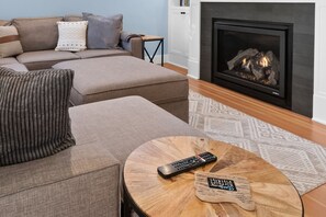 TV, fireplace, books, offices