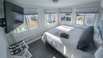 1 bedroom, desk, iron/ironing board, travel crib